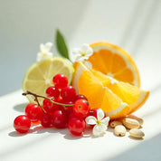 Currants, orange and mandarin representing the olfactory notes of the perfume.