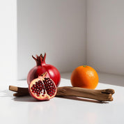 Grenadine and orange represent the olfactory notes of the perfume.